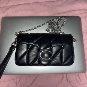 Tabby Crossbody Wristlet With Pillow Quilting. Black with silver hardware.